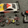 Onroad 1/10 chassis met body en banden + brushless motor en regelaar + servo + zender set (niet compleet / gebruikt)!