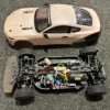 Tamiya onroad brushed RC auto met body, motor, regelaar, servo en ontvanger (gebruikt)!
