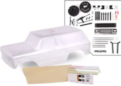 Traxxas Body, Ford Bronco (1979), complete (clear, trimmed, requires painting) (includes grille, side mirrors, door handles, windshield wipers, spare tire mount, decals, window masks) (requires TRX8072 inner fenders) – TRX8010P