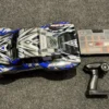 Traxxas Slash 4×4 brushless short course truck RTR met 120A regelaar en Traxxas aluminium stuurblokken / casterblokken/ achterblokken in een nette staat!