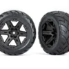 Traxxas Tires & wheels, assembled, glued (2.8″) (RXT black wheels, Anaconda tires, foam inserts) (4WD electric front/rear, 2WD electric front only) (2) (TSM rated) – TRX6775