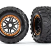 Traxxas Tires & wheels, assembled, glued (black, orange beadlock style wheels, Maxx MT tires, foam inserts) (2) (17mm splined) (TSM rated) – TRX8972T
