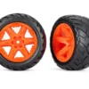 Traxxas Tires & wheels, assembled, glued (2.8″) (RXT orange wheels, Anaconda tires, foam inserts) (4WD electric front/rear, 2WD electric front only) (2) (TSM rated) – TRX6775A